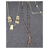 Lot of Jewelry Pieces Including Gold Tone Chains and Beaded Necklaces