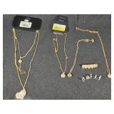 Gold and Silver Colored Jewelry Collection including Necklaces, Pendants, and Rings