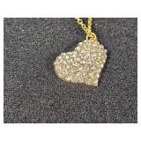 Gold and Silver Colored Jewelry Collection including Necklaces, Pendants, and Rings