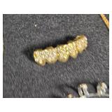 Gold and Silver Colored Jewelry Collection including Necklaces, Pendants, and Rings