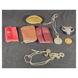 Assorted Vintage Collectibles including Liberty Bell Belt Buckle, Cadillac Emblem, and Leather Key Pouches