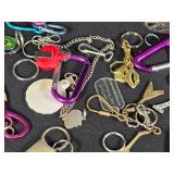 Large Lot of Assorted Keychains and Accessories featuring unique designs such as a beaded lizard, miniature license plates, and themed items from Las Vegas.