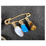 Lot of Jewelry Items Including Turquoise Ring, Necklace, and Brooch