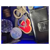 Assorted Household and Decorative Items including Coca-Cola Labels, Crystal Heart Trinket, and Butterfly Hair Clips