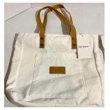 Cozy Earth Canvas Tote Bags with Tan Leather Handles and a soft cream pouch