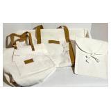 Cozy Earth Canvas Tote Bags with Tan Leather Handles and a soft cream pouch