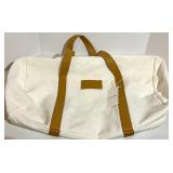 Cozy Earth Canvas Tote Bags with Tan Leather Handles and a soft cream pouch