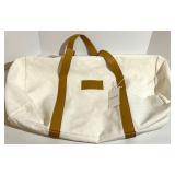 Cozy Earth Canvas Tote Bags with Tan Leather Handles and a soft cream pouch