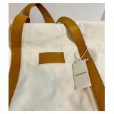 Cozy Earth Canvas Tote Bags with Tan Leather Handles and a soft cream pouch