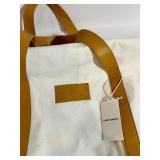 Cozy Earth Canvas Tote Bags with Tan Leather Handles and a soft cream pouch