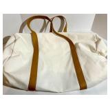 Cozy Earth Canvas Tote Bags with Tan Leather Handles and a soft cream pouch