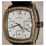 Skagen Denmark 558SGLD8A Crystal-Bezel Gold Tone Watch & Black Leather Strap