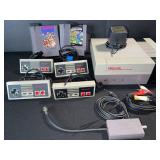 Nintendo NES-001 Entertainment System with 4 Controllers, 2 Cartridges, AV Cables & RF Modulator