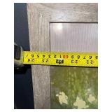 Framed Art Print - Lone Figure in Neon Floral Forest Scene