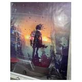 Framed Art Print - Silhouette with Backpack at Sunset City