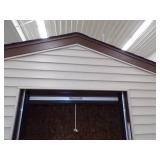 Vinyl Siding Building Display With Roll Down Door - 3 Sides