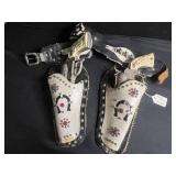 Gene Autry Cap Guns Pair - Ornate Western Toy Pistols with Ivory Grips & Leather Holsters