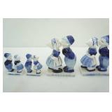 Vintage Delft Blue Dutch boy and girl kissing figurines (4ct)