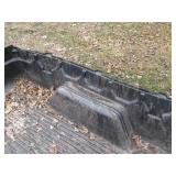 Rugged Liner branded truck bed line...