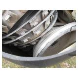 Plastic 55-gallon drum full of vint...