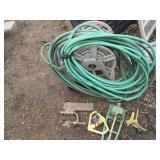 Hose reel, hose and sprinklers, one...
