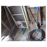 Corner of tools, pressure washer ho...