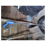 Corner of tools, pressure washer ho...