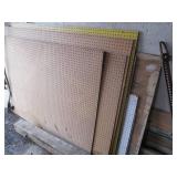 6 Sheets of pegboard and a 4 x 8 pl...
