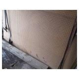 6 Sheets of pegboard and a 4 x 8 pl...