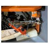 Stihl Chainsaw Parts & Chain Lot – Multiple Chains, Sharpeners, Parts, Case & Spotlight