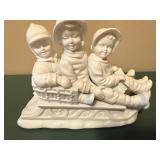 Three-Child Sled Figurine