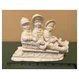 Three-Child Sled Figurine