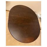 Oval Drop-Leaf Dining Table - Dark Wood, 34 in Diameter, Turned Legs