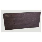 Stylish table with a wood-like surface and metal legs, measuring 59.5 x 30 inches.