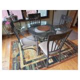 Round Glass Dining Table & 4 Cushioned Metal Chairs - rug not inc