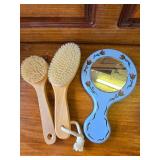 Blue Painted Mirror and Wooden Brushes Blue Painted Mirror and Wooden Brushes