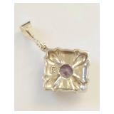 925 sterling silver pendant with faceted purple stone ornate floral setting