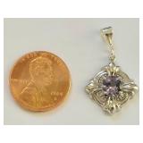 925 sterling silver pendant with faceted purple stone ornate floral setting