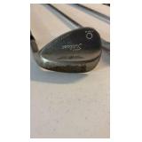 (3) GOLF clubs Titleist, Cleveland RTX 6, and Great White Tiger Shark GW-4