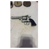 VINTAGE tin litho toy noise makers; mid-century Eagle cap gun