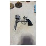 VINTAGE tin litho toy noise makers; mid-century Eagle cap gun