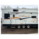 2006 CrossRoads Cross Terrain Toy Hauler 5th Wheel – Triple Axle – Generator – 2 Slide Outs