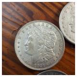 Lot of 5 :: 1921 Morgan silver dollars :: Weight: 26.7 grams 90% silver :: Popular by the US Mint!