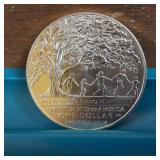 2017 Boys Town Centennial Silver Dollar :: 90% silver and 10% copper, weighs 26.73 :: 38.1 mm.