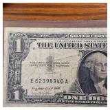 Series 1957A $1 Silver Certificate in circulated condition :: Blue Seal