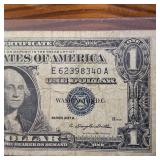 Series 1957A $1 Silver Certificate in circulated condition :: Blue Seal