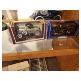 Lot of (2) 1:25 Scale Die-Cast Metal Collectibles - 1930 Ford Roadster Car and 12th Edition 1936 Ford Bank by Ertl Collectibles (in original packaging)