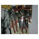 Black and red handled pliers assort...
