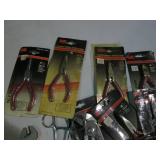 Black and red handled pliers assort...