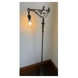 Ornate Cast-Iron Floor Lamp with Scroll Arm and Lattice Base Ornate Cast-Iron Floor Lamp with Scroll Arm and Lattice Base